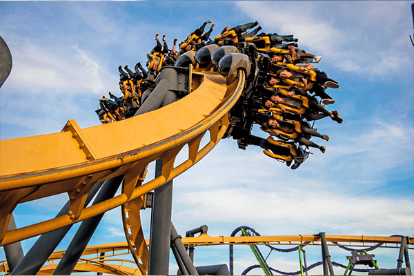 People riding a roller coaster