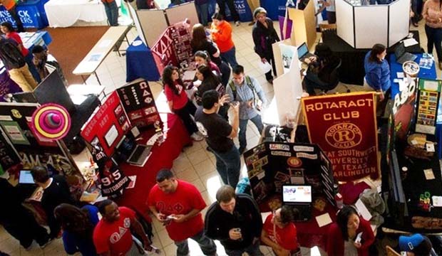 Overhead view of Activity Fair showing people at information booths.