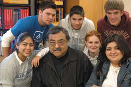 Photo of Chris Gomez with students